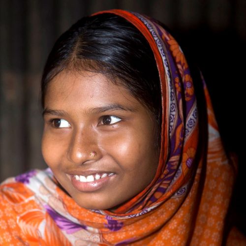 Happy, 15, is pregnant and lives in a slum of Dhaka, Bangladesh.