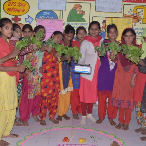 Health worker Mamta Rana and girls at a health centre in Uttar Pradesh