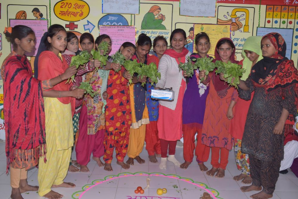 Health worker Mamta Rana and girls at a health centre in Uttar Pradesh