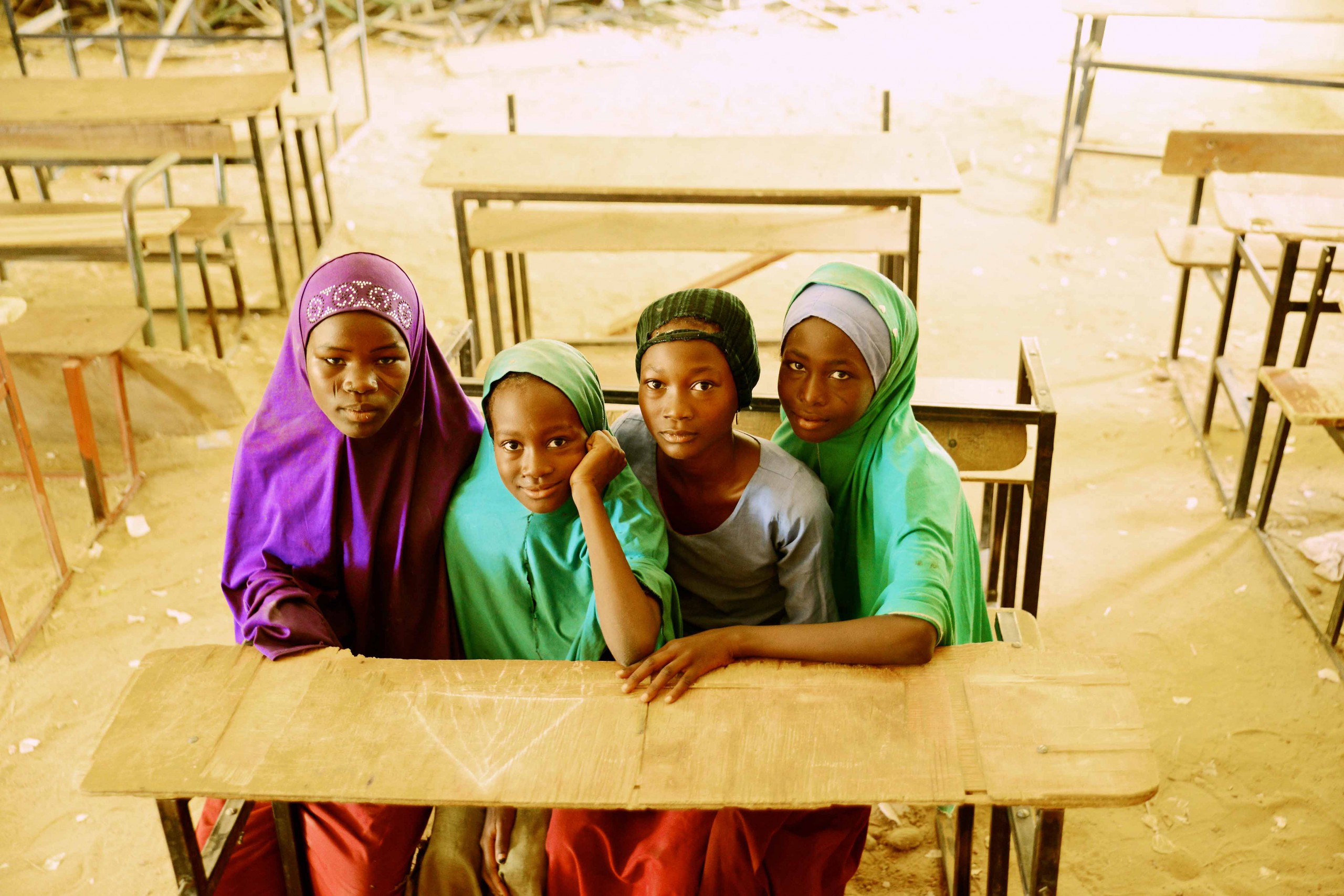 Four girls seating in a classroom in Niger Sud Dogo