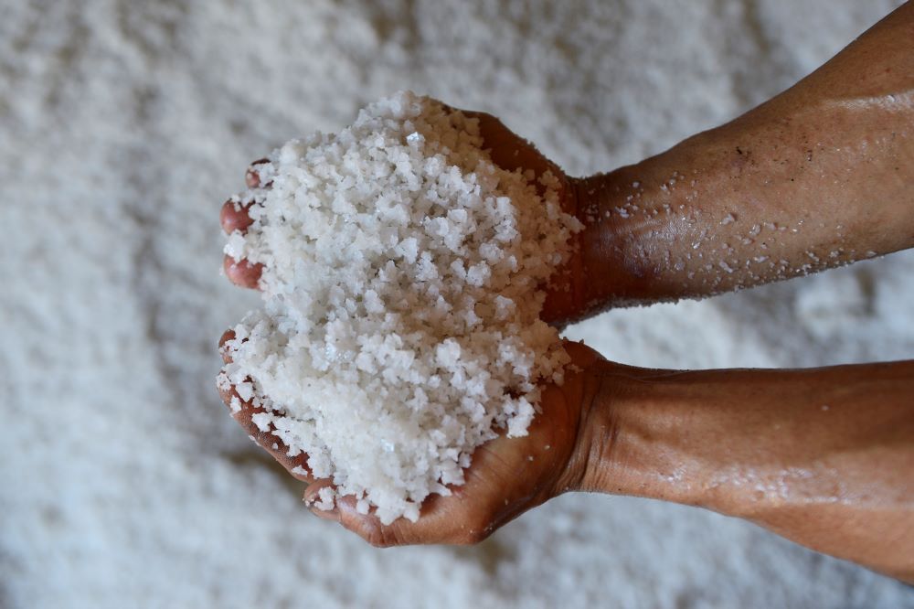 Handfuls of iodized salt in Indonesia