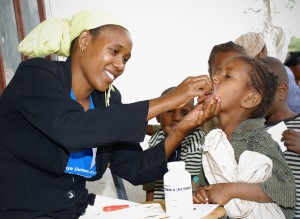 A child in Ethiopia taking a vitamin A