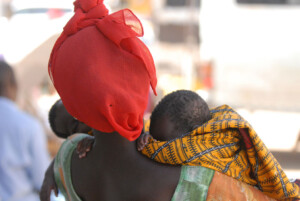 Woman in Senegal with babies